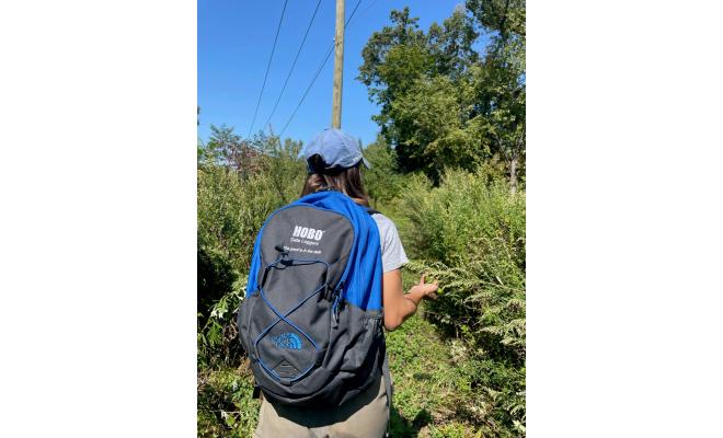 HOBO North Face Backpack on back of hiker