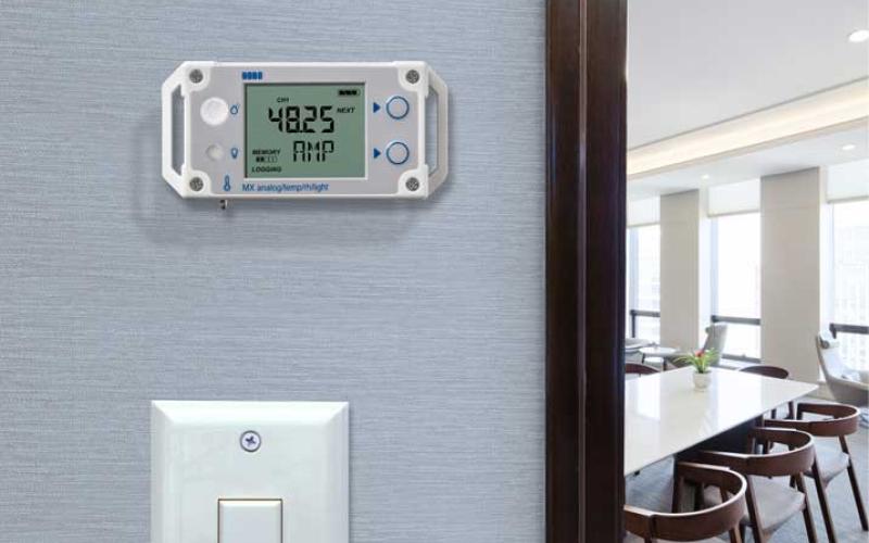 HOBO multi-channel data logger on an office wall